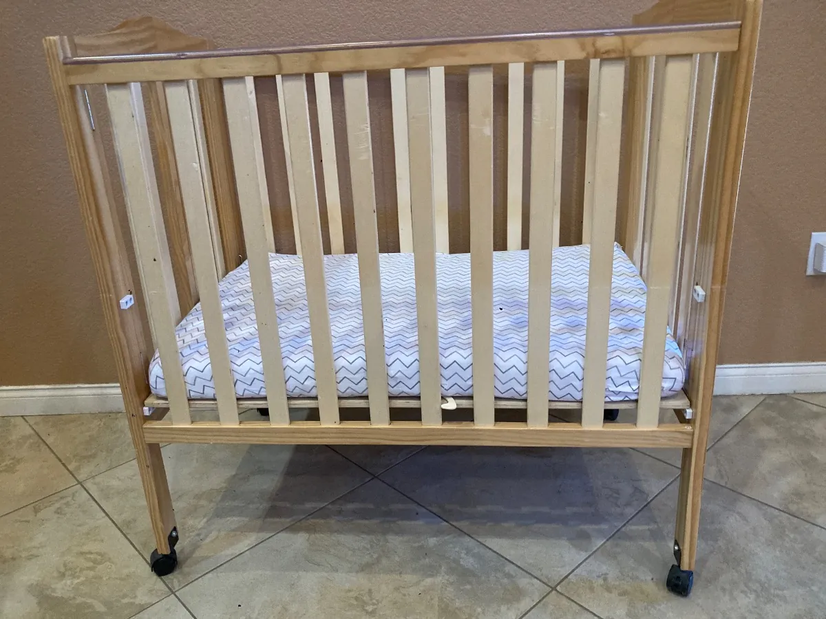 Portable mini crib with mattress